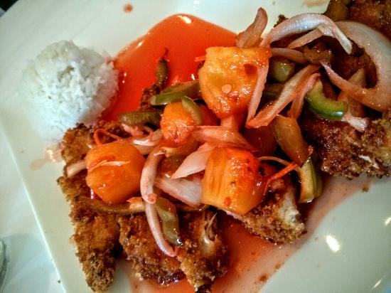 Blue Bamboo signature dishes Dragon Whiskers (flash-fried green beans), Panko-crusted Crab Cakes, General Tso's Chicken, Red Curry Shrimp and Grits